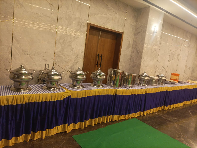 Elegant buffet chafing dish setup in banquet hall
